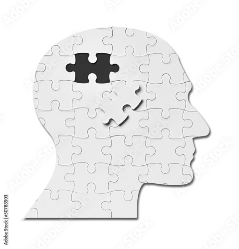 Photo: puzzle game solution head silhouette mind brain puzzle game solution head silhouette mind brain