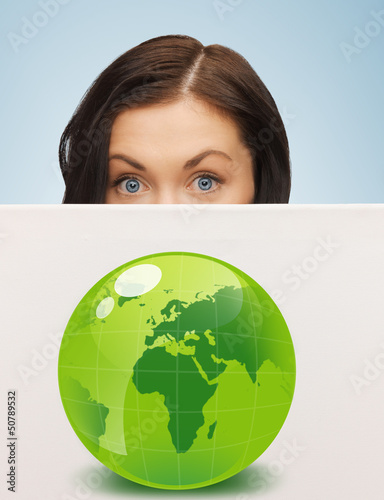 Photo: woman with illustration of green eco globe woman with illustration of green eco globe