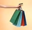multi colored shopping bags and credit card
