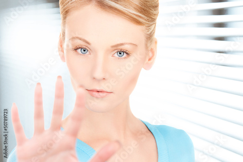 Photo: woman making stop gesture woman making stop gesture