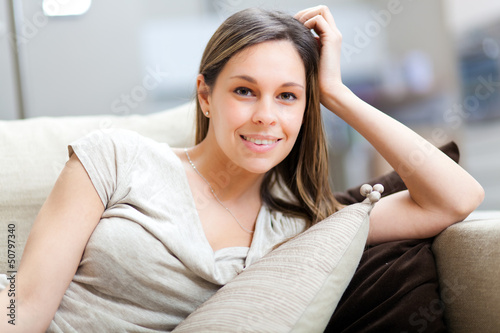 Photo: Woman relaxing on the sofa Woman relaxing on the sofa