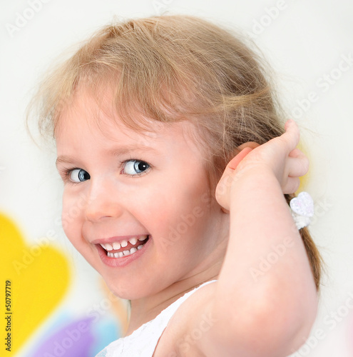 Photo: Smiling little girl portrait Smiling little girl portrait