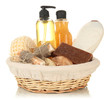 Composition of cosmetic bottles and soap in basket, isolated