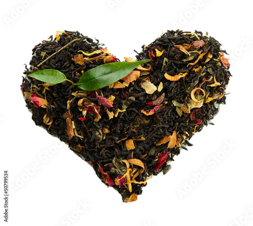 Photo: Dry black tea with green leaves, isolated on white Dry black tea with green leaves, isolated on white
