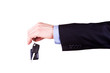 Male hand holding a car key . New car concept