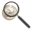 Coin dollar and magnifying glass isolated on white