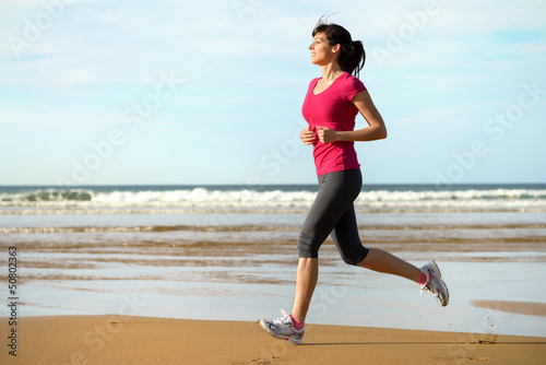 Photo: Fitness woman running Fitness woman running