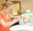 Photo: Feeding of child Feeding of child