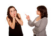 Mother scolding her teen daughter. Isolated on white