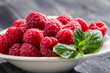 Fresh raspberries with mint leaf