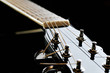 neck of black guitar