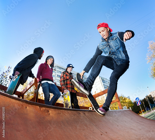 Photo: Skateboarder in skatepark Skateboarder in skatepark