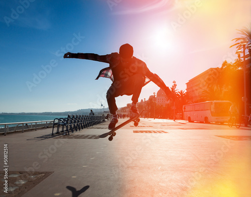 Photo: Silhouette of skateboarder Silhouette of skateboarder