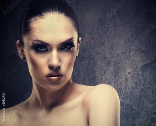 Photo: Charm. Female stylish portrait against abstract background Charm. Female stylish portrait against abstract background