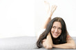 Woman lying on her front