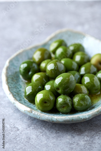 Photo: Castelvetrano Olives on a Ceramic Plate Castelvetrano Olives on a Ceramic Plate