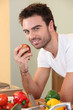 Man eating an apple