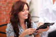 Woman watching the bill in a restaurant