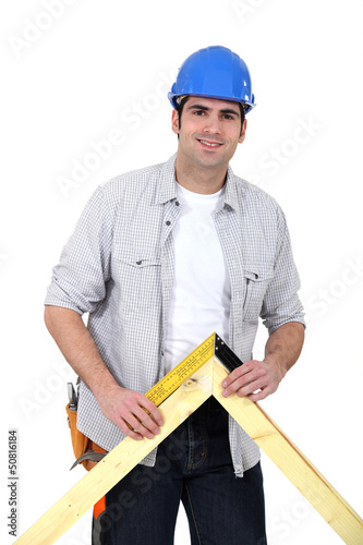 Photo: Carpenter with wood Carpenter with wood
