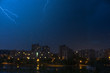 danger flash on panel building in night with drops on window
