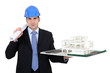 Architect holding model housing