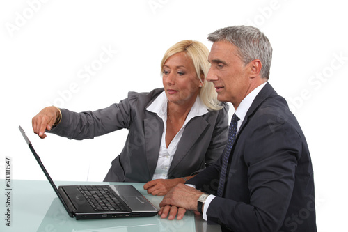 Photo: Senior business partners working together Senior business partners working together