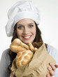 Smiling chef with italian bread