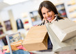 Portrait of shopaholic woman smiling