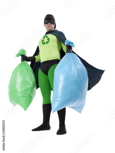 Photo: Eco superhero and household garbage Eco superhero and household garbage
