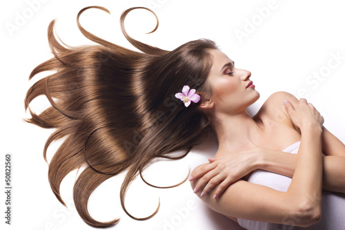 Photo: young woman with beautiful brown hair young woman with beautiful brown hair