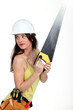 Woman with handsaw