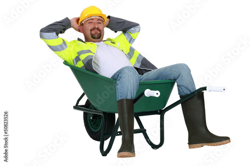 Photo: craftsman sitting in a wheelbarrow craftsman sitting in a wheelbarrow