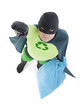 Eco superhero and household garbage