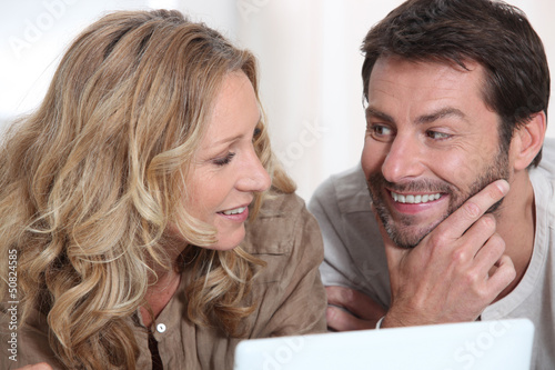 Photo: Couple with computer Couple with computer
