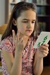 Little Hispanic Girl Doing Math Cards