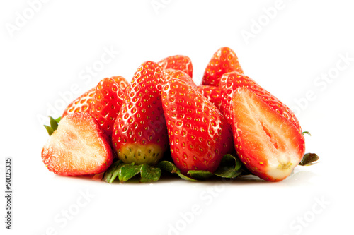 Photo: Strawberries with leaves. Isolated on a white background. Strawberries with leaves. Isolated on a white background.