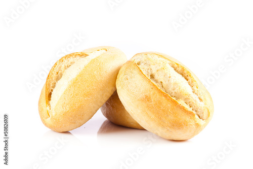Photo: Bread on a white background. delicious buns isolated on white Bread on a white background. delicious buns isolated on white