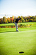 Man playing golf