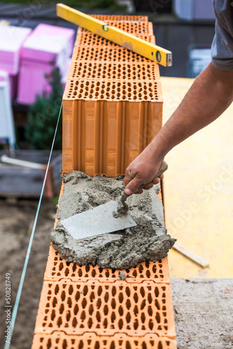 Photo: Bauarbeiter auf einer Baustelle Bauarbeiter auf einer Baustelle