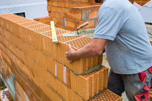 Photo: Bauarbeiter auf einer Baustelle Bauarbeiter auf einer Baustelle