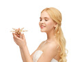 woman with butterfly in hand
