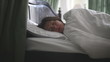 Portrait of a young girl sleeping on a pillow