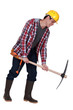Labourer performing back-breaking work