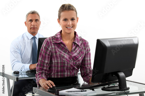 Photo: Business people working at computers Business people working at computers