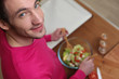 Man preparing healthy salad