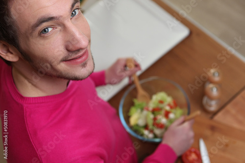 Photo: Man preparing healthy salad Man preparing healthy salad