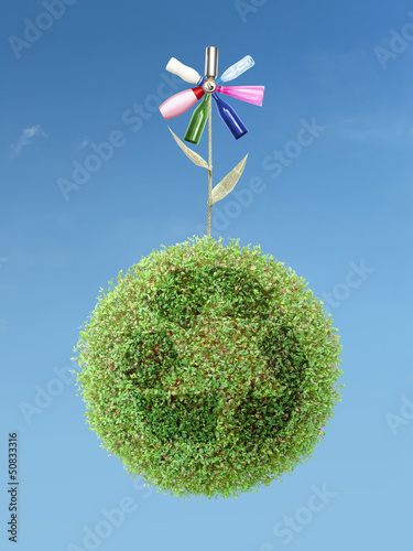 Photo: Eco flower on green recycle planet Eco flower on green recycle planet