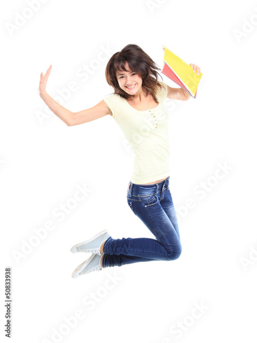 Photo: female student jumping of success isolated female student jumping of success isolated