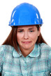 Photo: A crying female construction worker. A crying female construction worker.