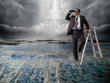 Businessman with binoculars.